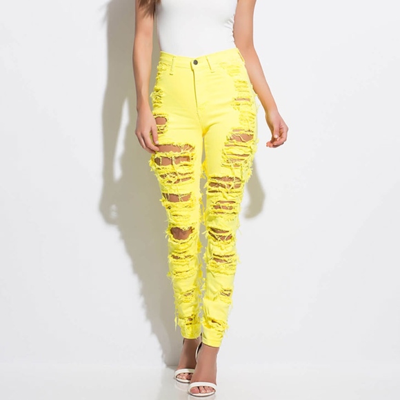 neon yellow ripped jeans